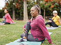 women exercise class in a park